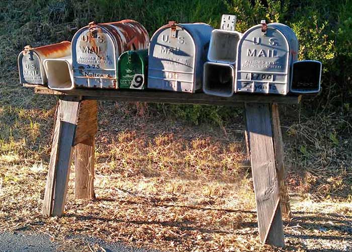 Rusted rural mailboxes near Patrick Mountain Brand Marketing.